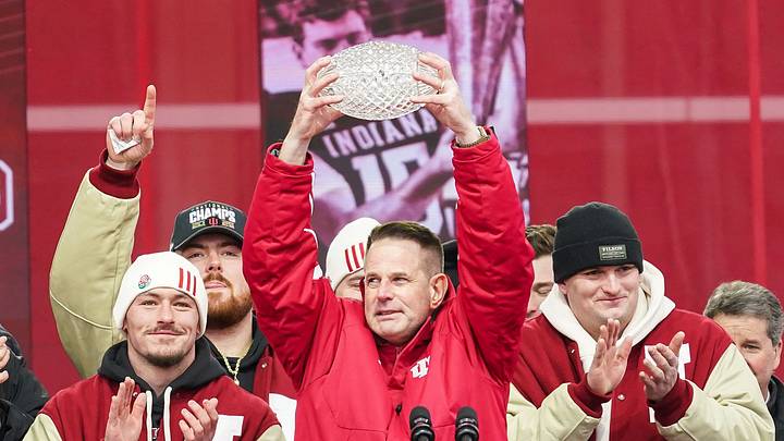 Jan 24, 2026; Bloomington, IN, USA; Indiana Hoosiers head coach Curt Cignetti holds up the coaches trophy on Saturday, Jan. 24, 2026, during the Indiana Football College Football Playoff National Championship celebration and parade at Memorial Stadium. Mandatory Credit: Grace Hollars-USA TODAY Network via Imagn Images Jan 24, 2026; Bloomington, IN, USA; Indiana Hoosiers head coach Curt Cignetti holds up the coaches trophy on Saturday, Jan. 24, 2026, during the Indiana Football College Football Playoff National Championship celebration and parade at Memorial Stadium. Mandatory Credit: Grace Hollars-USA TODAY Network via Imagn Images
