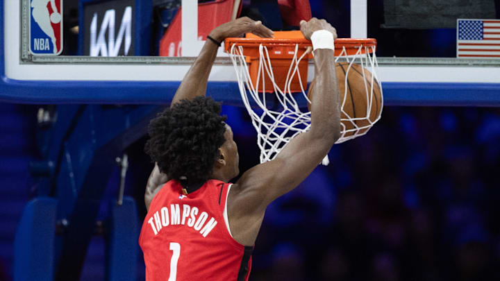 Nov 27, 2024; Philadelphia, Pennsylvania, USA; Houston Rockets forward Amen Thompson (1) dunks the ball against the Philadelphia 76ers during the second quarter at Wells Fargo Center. Mandatory Credit: Bill Streicher-Imagn Images