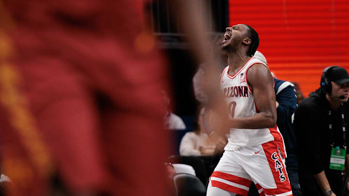 Mar 13, 2026; Kansas City, MO, USA; Arizona Wildcats guard Jaden Bradley (0) reacts at the end of the game against the Iowa State Cyclones at T-Mobile Center. Mandatory Credit: William Purnell-Imagn Images