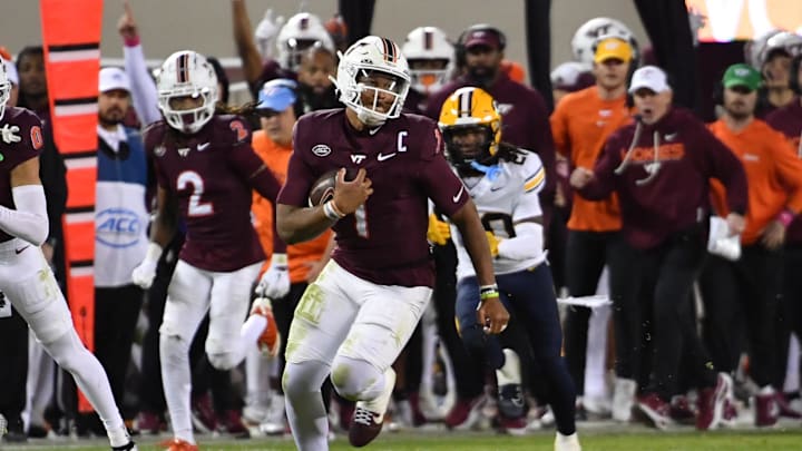 Oct 24, 2025; Blacksburg, Virginia, USA;  Virginia Tech Hokies quarterback Kyron Drones (1) runs the ball against the California Golden Bears during the fourth quarter at Lane Stadium. Mandatory Credit: Brian Bishop-Imagn Images