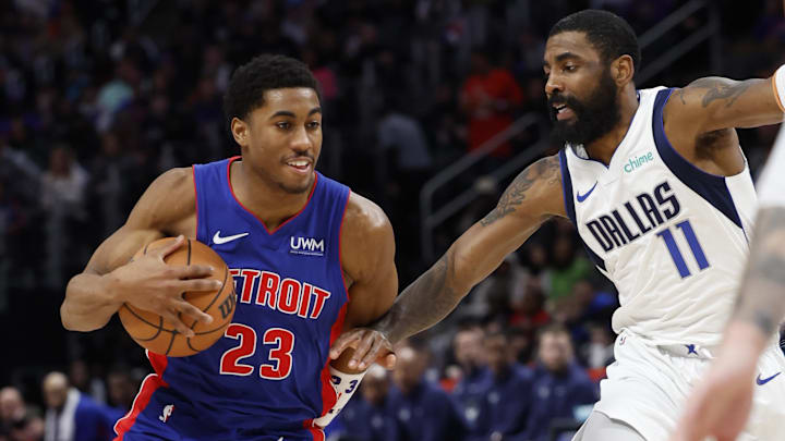 Mar 9, 2024; Detroit, Michigan, USA; Detroit Pistons guard Jaden Ivey (23) dribbles against Dallas Mavericks guard Kyrie Irving (11) in the second half at Little Caesars Arena. Mandatory Credit: Rick Osentoski-Imagn Images Mar 9, 2024; Detroit, Michigan, USA; Detroit Pistons guard Jaden Ivey (23) dribbles against Dallas Mavericks guard Kyrie Irving (11) in the second half at Little Caesars Arena. Mandatory Credit: Rick Osentoski-Imagn Images