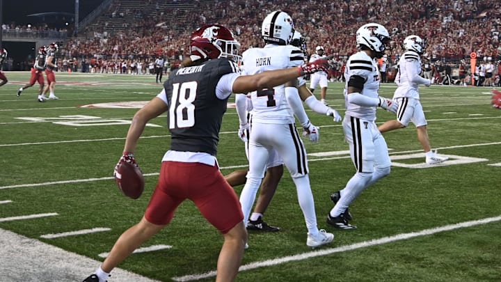 Sep 7, 2024; Pullman, Washington, USA; Washington State Cougars wide receiver Josh Meredith (18) celebrates a first down against the Texas Tech Red Raiders in the second half at Gesa Field at Martin Stadium. Washington State Cougars won 37-16. Mandatory Credit: James Snook-Imagn Images