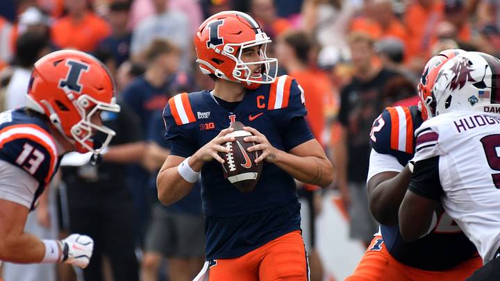 Sep 19, 2026; Champaign, Illinois, USA;  Illinois Fighting Illini quarterback Katin Houser (4) looks to pass during the first half against the Southern Illinois Salukis at Gies Memorial Stadium.  Mandatory Credit: Ron Johnson-Imagn Images