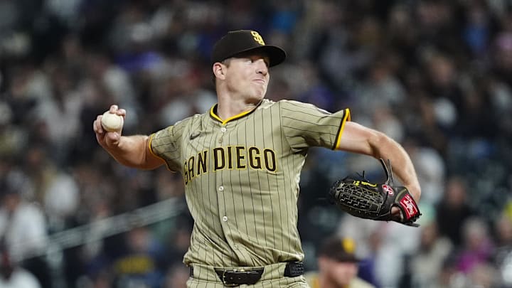 Sep 5, 2025; Denver, Colorado, USA; San Diego Padres starting pitcher Nick Pivetta (27) delivers a pitch in the fifth inning against the Colorado Rockies at Coors Field. Mandatory Credit: Ron Chenoy-Imagn Images
