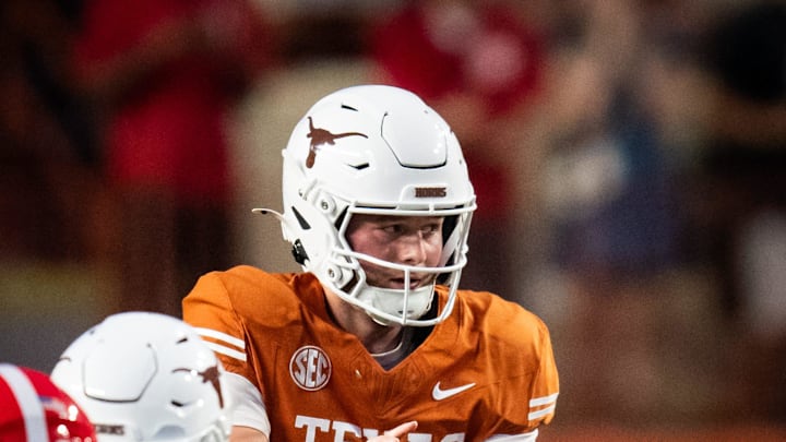 Oct 19, 2024; Austin, Texas, USA; Texas Longhorns quarterback Quinn Ewers (3) takes a snap against the Georgia Bulldogs in the first quarter at Darrell K. Royal Texas Memorial Stadium. Mandatory Credit: Sara Diggins/USA TODAY Network via Imagn Images