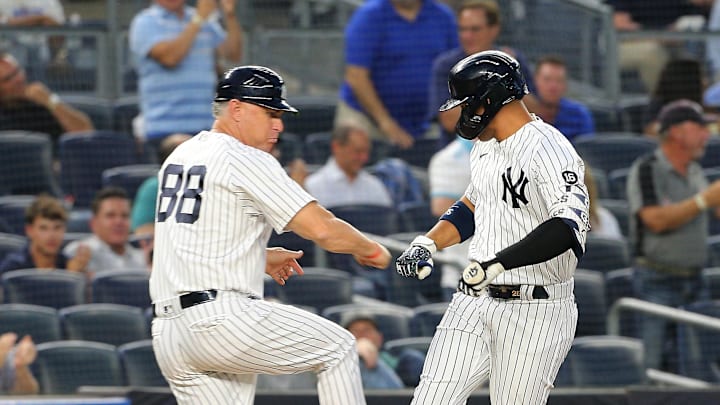 Jul 21, 2021; Bronx, New York, USA; New York Yankees shortstop Gleyber Torres (25) is congratulated