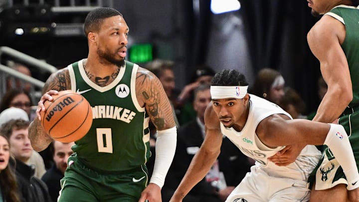 Mar 5, 2025; Milwaukee, Wisconsin, USA; Milwaukee Bucks guard Damian Lillard (0) drives for the basket against Dallas Mavericks guard Brandon Williams (10) in the third quarter at Fiserv Forum. Mandatory Credit: Benny Sieu-Imagn Images
