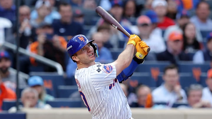 Oct 8, 2024; New York City, New York, USA; New York Mets first baseman Pete Alonso (20) hits a solo home run in the second inning against the Philadelphia Phillies during game three of the NLDS for the 2024 MLB Playoffs at Citi Field. Mandatory Credit: Brad Penner-Imagn Images Oct 8, 2024; New York City, New York, USA; New York Mets first baseman Pete Alonso (20) hits a solo home run in the second inning against the Philadelphia Phillies during game three of the NLDS for the 2024 MLB Playoffs at Citi Field. Mandatory Credit: Brad Penner-Imagn Images