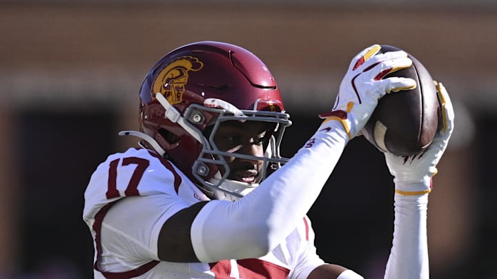Oct 19, 2024; College Park, Maryland, USA;  Southern California Trojans cornerback DeCarlos Nicholson (17) warms cup before the game against the Maryland Terrapins at SECU Stadium. Mandatory Credit: Tommy Gilligan-Imagn Images