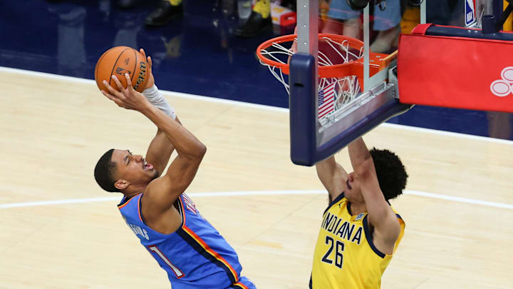 Jun 19, 2025; Indianapolis, Indiana, USA; Oklahoma City Thunder guard Aaron Wiggins (21) shoots the ball defended by Indiana Pacers guard Ben Sheppard (26) in the fourth quarter during game six of the 2025 NBA Finals at Gainbridge Fieldhouse. Mandatory Credit: Trevor Ruszkowski-Imagn Images Jun 19, 2025; Indianapolis, Indiana, USA; Oklahoma City Thunder guard Aaron Wiggins (21) shoots the ball defended by Indiana Pacers guard Ben Sheppard (26) in the fourth quarter during game six of the 2025 NBA Finals at Gainbridge Fieldhouse. Mandatory Credit: Trevor Ruszkowski-Imagn Images
