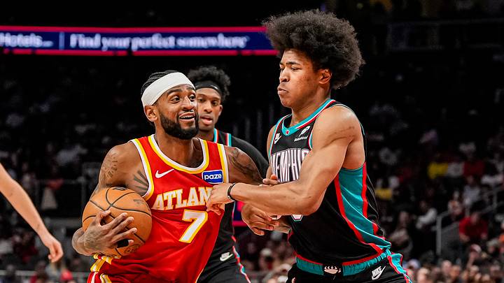 Mar 23, 2026; Atlanta, Georgia, USA; Atlanta Hawks guard Nickeil Alexander-Walker (7) tries to get to the basket against Memphis Grizzlies forward Jaylen Wells (0) during the second half at State Farm Arena. Mandatory Credit: Dale Zanine-Imagn Images Mar 23, 2026; Atlanta, Georgia, USA; Atlanta Hawks guard Nickeil Alexander-Walker (7) tries to get to the basket against Memphis Grizzlies forward Jaylen Wells (0) during the second half at State Farm Arena. Mandatory Credit: Dale Zanine-Imagn Images