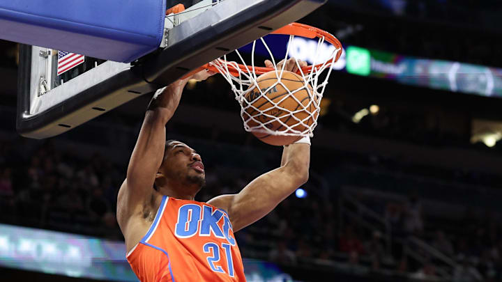 Dec 19, 2024; Orlando, Florida, USA; Oklahoma City Thunder guard Aaron Wiggins (21) dunks the ball against the Orlando Magic in the fourth quarter at Kia Center. Mandatory Credit: Nathan Ray Seebeck-Imagn Images Dec 19, 2024; Orlando, Florida, USA; Oklahoma City Thunder guard Aaron Wiggins (21) dunks the ball against the Orlando Magic in the fourth quarter at Kia Center. Mandatory Credit: Nathan Ray Seebeck-Imagn Images