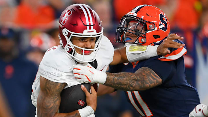 Sep 20, 2024; Syracuse, New York, USA; Syracuse Orange defensive lineman Denis Jaquez Jr. (11) sacks Stanford Cardinal quarterback Ashton Daniels (14) during the first half at the JMA Wireless Dome. Mandatory Credit: Rich Barnes-Imagn Images