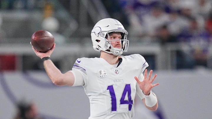 Dec 16, 2024; Minneapolis, Minnesota, USA; Minnesota Vikings quarterback Sam Darnold (14) passes the ball against the Chicago Bears in the fourth quarter at U.S. Bank Stadium. Mandatory Credit: Brad Rempel-Imagn Images Dec 16, 2024; Minneapolis, Minnesota, USA; Minnesota Vikings quarterback Sam Darnold (14) passes the ball against the Chicago Bears in the fourth quarter at U.S. Bank Stadium. Mandatory Credit: Brad Rempel-Imagn Images