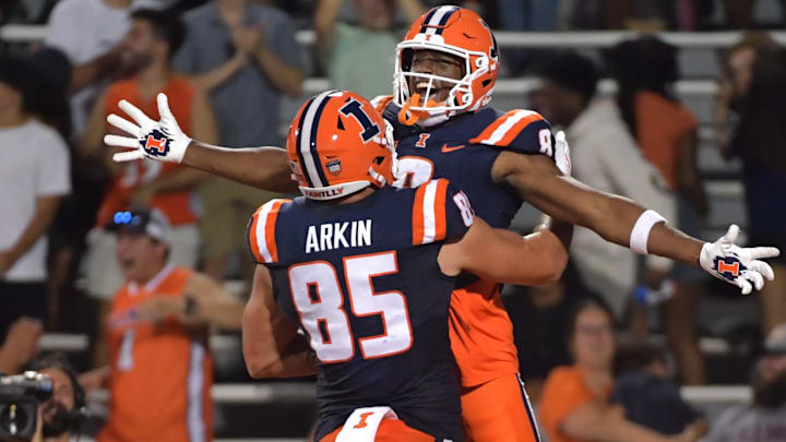 Aug 29, 2024; Champaign, Illinois, USA; Illinois Fighting Illini tight end Tanner Arkin (85) celebrates teammate Illinois wide receiver Malik Elzy (8) touchdown during the first half at Memorial Stadium. Mandatory Credit: Ron Johnson-Imagn Images Aug 29, 2024; Champaign, Illinois, USA; Illinois Fighting Illini tight end Tanner Arkin (85) celebrates teammate Illinois wide receiver Malik Elzy (8) touchdown during the first half at Memorial Stadium. Mandatory Credit: Ron Johnson-Imagn Images
