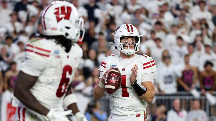 Sep 26, 2026; University Park, Pennsylvania, USA; Wisconsin Badgers quarterback Colton Joseph (1) drops back while looking to throw a pass during the fourth quarter against the Penn State Nittany Lions at West Shore Home Field at Beaver Stadium. Mandatory Credit: Matthew O'Haren-Imagn Images Sep 26, 2026; University Park, Pennsylvania, USA; Wisconsin Badgers quarterback Colton Joseph (1) drops back while looking to throw a pass during the fourth quarter against the Penn State Nittany Lions at West Shore Home Field at Beaver Stadium. Mandatory Credit: Matthew O'Haren-Imagn Images