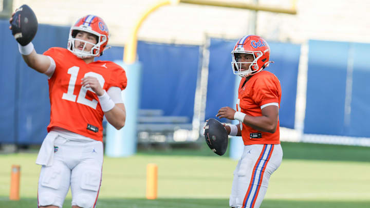 Florida quarterback Aaron Philo (12) throws with Florida quarterback Tramell Jones Jr. (9) during spring practice at Sanders Practice Fields in Gainesville, FL on Thursday, March 12, 2026. [Alan Youngblood/Gainesville Sun]