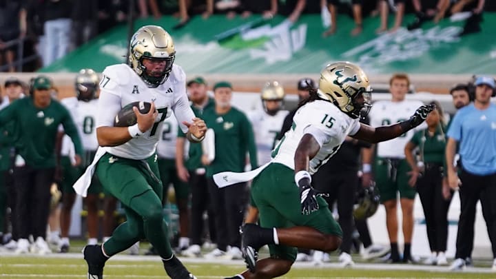 USF quarterback Byrum Brown helped the Bulls to a key American Conference win over North Texas.