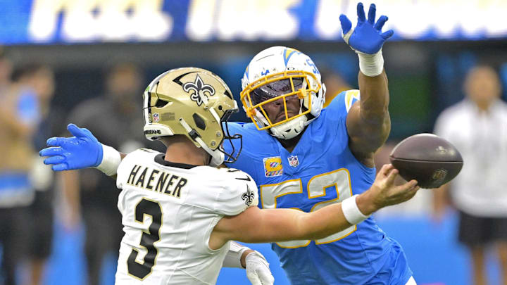 Los Angeles Chargers linebacker Khalil Mack forces New Orleans Saints quarterback Jake Haener to throw an incomplete pass in the second half at SoFi Stadium. 