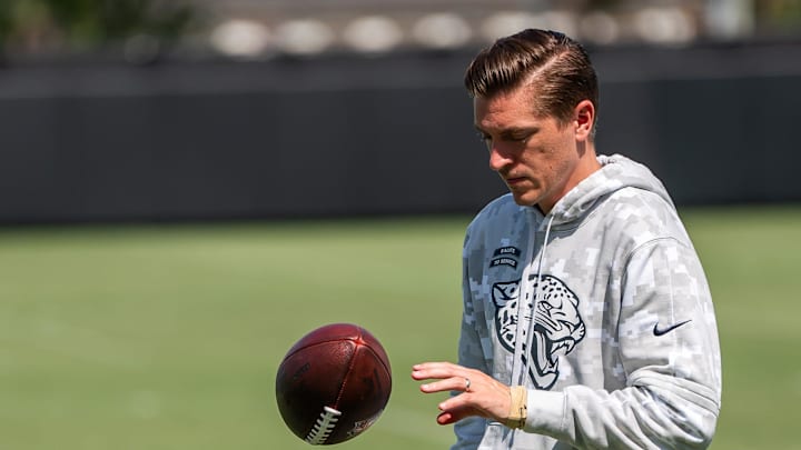 Jacksonville Jaguars general manager James Gladstone bounces the ball off the field after the Jacksonville Jaguars’ third mandatory minicamp Thursday June 12, 2025 at the Miller Electric Center in Jacksonville, Fla. [Doug Engle/Florida Times-Union]