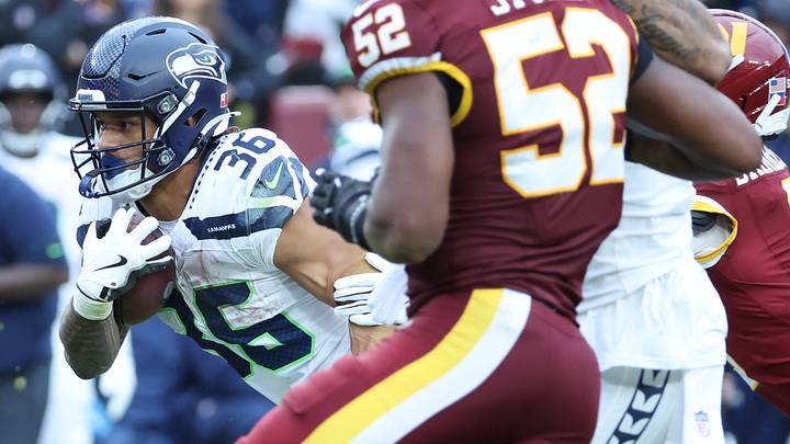Sep 27, 2026; Landover, Maryland, USA;  Seattle Seahawks running back George Holani (36) rushes the ball against the Washington Commanders at Northwest Stadium.
