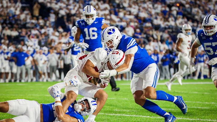 BYU linebacker Jack Kelly and Faletau Satuala force a safety against Stanford