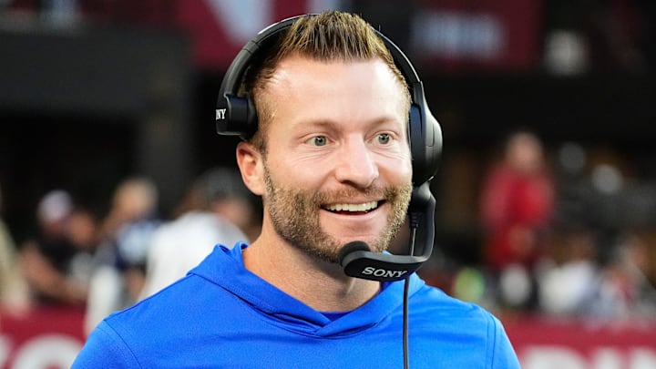 Los Angeles Rams head coach Sean McVay smiles after a touchdown by wide receiver Puka Nacua (12) against the Arizona Cardinals in the second half at State Farm Stadium on Dec 7, 2025, in Glendale, Ariz.