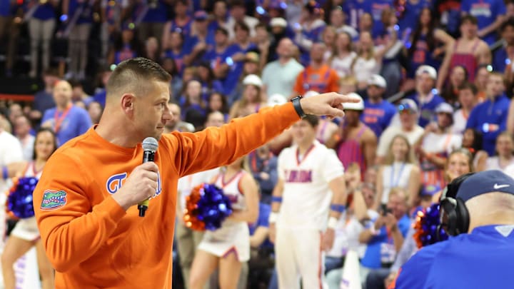 New Gator head football coach Jon Sumrall fires up the crowd during the first half an NCAA basketball game at Steven C. O'Connell Center Exactek arena in Gainesville, FL on Saturday, January 24, 2026. Auburn won 76-67 [Alan Youngblood/Gainesville Sun]