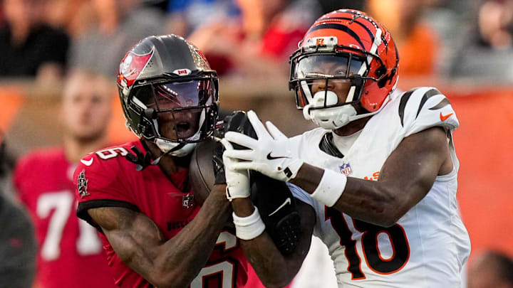 Tampa Bay Buccaneers cornerback Keenan Isaac (16) intercepts a pass intended for Cincinnati Bengals wide receiver Kwamie Lassiter II (18) in the second quarter of the NFL Preseason Week 1 game between the Cincinnati Bengals and the Tampa Bay Buccaneers at Paycor Stadium in downtown Cincinnati on Saturday, Aug. 10, 2024. Tampa Bay Buccaneers cornerback Keenan Isaac (16) intercepts a pass intended for Cincinnati Bengals wide receiver Kwamie Lassiter II (18) in the second quarter of the NFL Preseason Week 1 game between the Cincinnati Bengals and the Tampa Bay Buccaneers at Paycor Stadium in downtown Cincinnati on Saturday, Aug. 10, 2024.