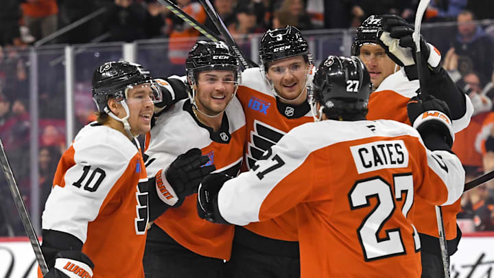 Nov 18, 2024; Philadelphia, Pennsylvania, USA; Philadelphia Flyers right wing Tyson Foerster (71) celebrates his goal with teammates against the Colorado Avalanche at Wells Fargo Center. Mandatory Credit: Eric Hartline-Imagn Images