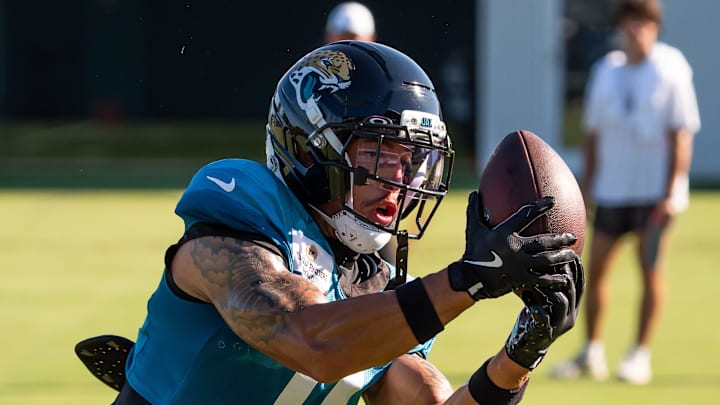 Jacksonville Jaguars wide receiver Parker Washington (11) catches a pass while running routes during an NFL training camp fifth session at the Miller Electric Center, Monday, July 28, 2025, in Jacksonville, Fla. [Doug Engle/Florida Times-Union]