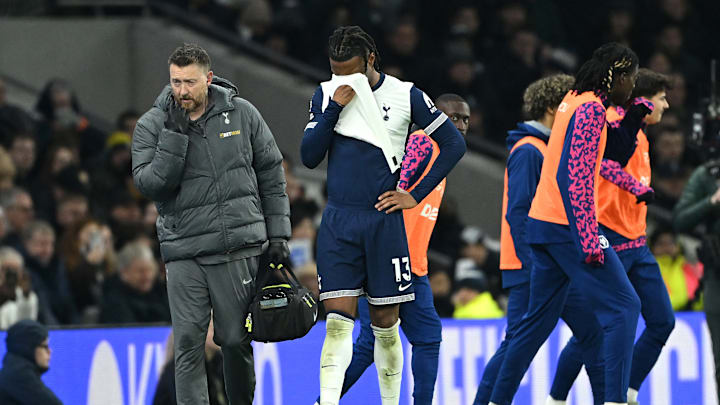 Destiny Udogie looks dejected after being taken off against Wolves