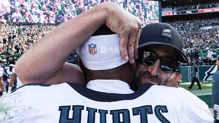 Sep 21, 2025; Philadelphia, Pennsylvania, USA; Philadelphia Eagles quarterback Jalen Hurts (1) and head coach Nick Sirianni celebrate after a victory against the Los Angeles Rams at Lincoln Financial Field. Mandatory Credit: Bill Streicher-Imagn Images