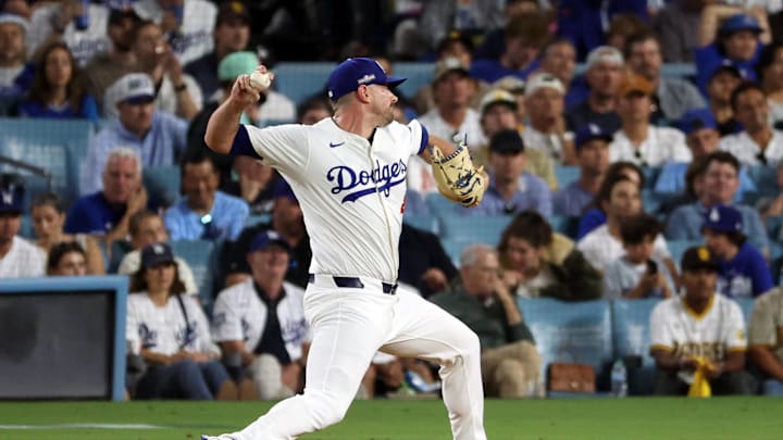 Oct 6, 2024; Los Angeles, California, USA; Los Angeles Dodgers pitcher Daniel Hudson (41) pitches in the seventh inning against the San Diego Padres during game two of the NLDS for the 2024 MLB Playoffs at Dodger Stadium. Mandatory Credit: Kiyoshi Mio-Imagn Images Oct 6, 2024; Los Angeles, California, USA; Los Angeles Dodgers pitcher Daniel Hudson (41) pitches in the seventh inning against the San Diego Padres during game two of the NLDS for the 2024 MLB Playoffs at Dodger Stadium. Mandatory Credit: Kiyoshi Mio-Imagn Images