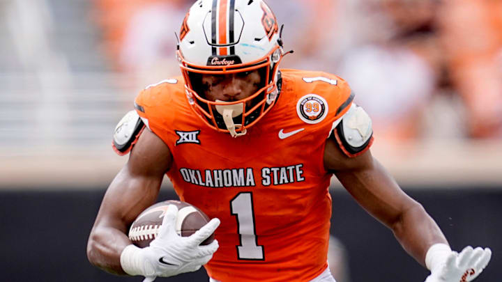 Oklahoma State's De'Zhaun Stribling (1) gets by South Dakota State's Myles Taylor (2) after a reception in the second half of the college football game between the Oklahoma State Cowboys and South Dakota State Jackrabbits at Boone Pickens Stadium in Stillwater, Okla., Saturday, Aug., 31, 2024. Oklahoma State's De'Zhaun Stribling (1) gets by South Dakota State's Myles Taylor (2) after a reception in the second half of the college football game between the Oklahoma State Cowboys and South Dakota State Jackrabbits at Boone Pickens Stadium in Stillwater, Okla., Saturday, Aug., 31, 2024.