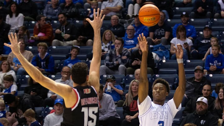 Jaxon Robinson fires a 3 against Denver University