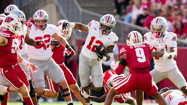 Ohio State Buckeyes running back CJ Donaldson Jr. (12) runs the ball in the second half at Camp Randall Stadium on Saturday, Oct. 18, 2025 in Madison, Wisconsin.