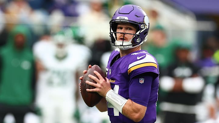 Oct 6, 2024; Tottenham, ENG; Minnesota Vikings Quarterback Sam Darnold (14) looks to throw a pass in the 1st Quarter against New York Jets at Tottenham Hotspur Stadium.