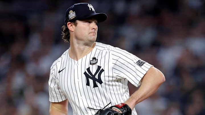 Oct 30, 2024; New York, New York, USA; New York Yankees pitcher Gerrit Cole (45) pitches during the first inning against the Los Angeles Dodgers in game four of the 2024 MLB World Series at Yankee Stadium. Mandatory Credit: Brad Penner-Imagn Images
