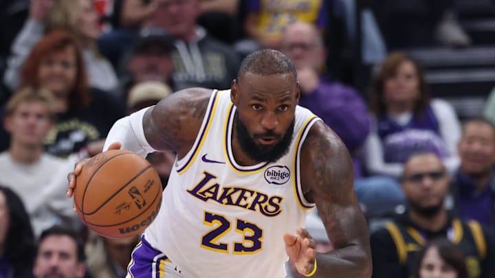 Nov 23, 2025; Salt Lake City, Utah, USA; Los Angeles Lakers forward LeBron James (23) brings the ball up the court against the Utah Jazz during the first half at Delta Center. Mandatory Credit: Rob Gray-Imagn Images