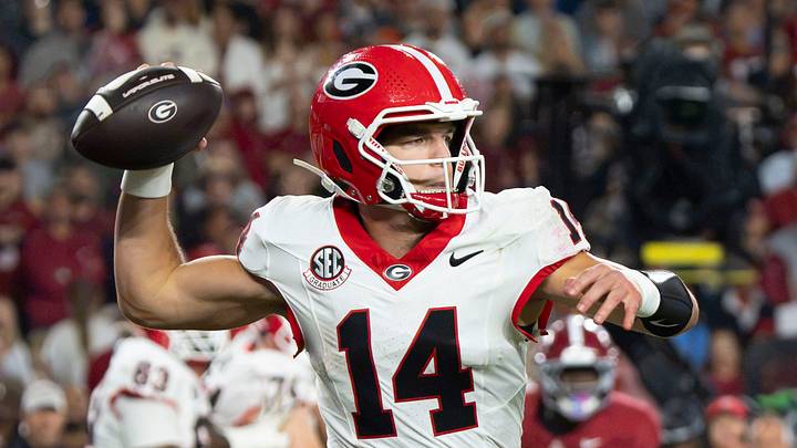 Oct 10, 2026; Tuscaloosa, Alabama, USA; Georgia quarterback Gunner Stockton (14) throws on the run during the game with Alabama at Saban Field at Bryant-Denny Stadium. Mandatory Credit: Gary Cosby Jr.-Imagn Images Oct 10, 2026; Tuscaloosa, Alabama, USA; Georgia quarterback Gunner Stockton (14) throws on the run during the game with Alabama at Saban Field at Bryant-Denny Stadium. Mandatory Credit: Gary Cosby Jr.-Imagn Images