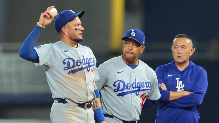 Sep 13, 2026; Miami, Florida, USA; Los Angeles Dodgers manager Dave Roberts (30) checks on second baseman Miguel Rojas (72) after a collision with shortstop Mookie Betts (not pictured) during the eighth inning at loanDepot Park. Mandatory Credit: Sam Navarro-Imagn Images Sep 13, 2026; Miami, Florida, USA; Los Angeles Dodgers manager Dave Roberts (30) checks on second baseman Miguel Rojas (72) after a collision with shortstop Mookie Betts (not pictured) during the eighth inning at loanDepot Park. Mandatory Credit: Sam Navarro-Imagn Images