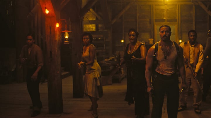 (L-r) JAYME LAWSON as Pearline, WUNMI MOSAKU as Annie, MICHAEL B. JORDAN as Smoke, MILES CATON as Sammie Moore, and LI JUN LI as Grace Chow, in Warner Bros. Pictures’ “SINNERS,” a Warner Bros. Pictures release.