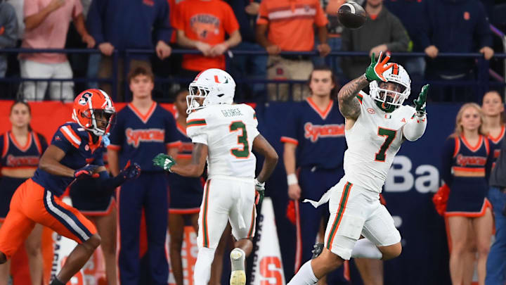 Nov 30, 2024; Syracuse, New York, USA; Miami Hurricanes wide receiver Xavier Restrepo (7) catches the ball against the Syracuse Orange during the first half at the JMA Wireless Dome. Mandatory Credit: Rich Barnes-Imagn Images Nov 30, 2024; Syracuse, New York, USA; Miami Hurricanes wide receiver Xavier Restrepo (7) catches the ball against the Syracuse Orange during the first half at the JMA Wireless Dome. Mandatory Credit: Rich Barnes-Imagn Images
