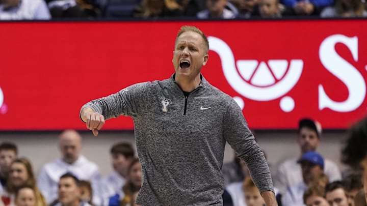 Feb 14, 2026; Provo, Utah, USA; BYU Cougars head coach Kevin Young reacts during the first half against the Colorado Buffaloes at the Marriott Center. Mandatory Credit: Aaron Baker-Imagn Images