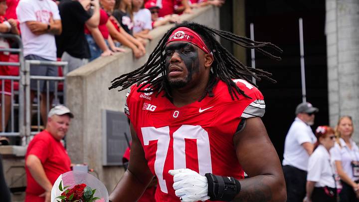Ohio State Buckeyes offensive lineman Phillip Daniels (70) runs to the field as he is honored during senior day ceremonies before the NCAA football game against the Ball State Cardinals at Ohio Stadium on Sept. 5, 2026 in Columbus, Ohio. Ohio State Buckeyes offensive lineman Phillip Daniels (70) runs to the field as he is honored during senior day ceremonies before the NCAA football game against the Ball State Cardinals at Ohio Stadium on Sept. 5, 2026 in Columbus, Ohio.