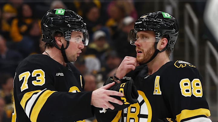 Mar 24, 2026; Boston, Massachusetts, USA; Boston Bruins defenseman Charlie McAvoy (73) talks with right wing David Pastrnak (88) during the third period against the Toronto Maple Leafs at TD Garden. Mandatory Credit: Winslow Townson-Imagn Images