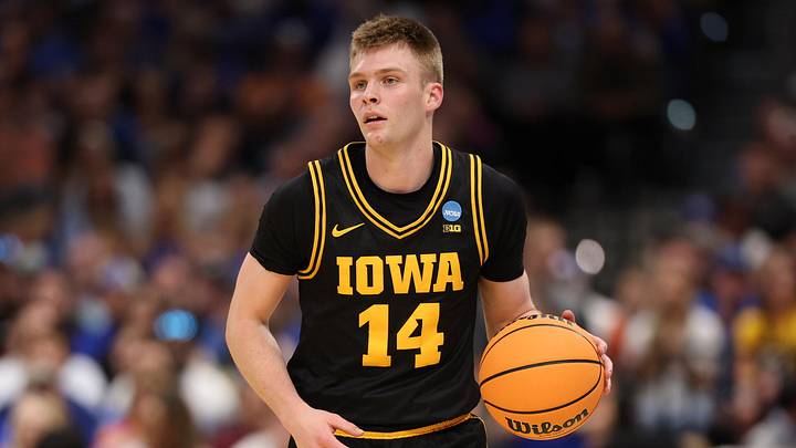 Mar 22, 2026; Tampa, FL, USA; Iowa Hawkeyes guard Bennett Stirtz (14) dribbles the ball against the Florida Gators in the first half during a second round game of the men's 2026 NCAA Tournament at Benchmark International Arena. Mandatory Credit: Matt Pendleton-Imagn Images Mar 22, 2026; Tampa, FL, USA; Iowa Hawkeyes guard Bennett Stirtz (14) dribbles the ball against the Florida Gators in the first half during a second round game of the men's 2026 NCAA Tournament at Benchmark International Arena. Mandatory Credit: Matt Pendleton-Imagn Images