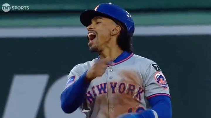 Francisco Lindor encourages the umpire to throw Walker Buehler out of the game on Tuesday.