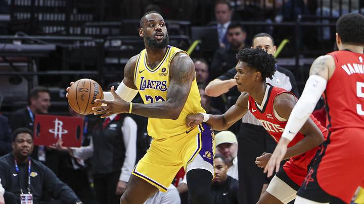 Jan 29, 2024; Houston, Texas, USA; Los Angeles Lakers forward LeBron James (23) controls the ball as Houston Rockets forward Amen Thompson (1) defends during the second quarter at Toyota Center. Mandatory Credit: Troy Taormina-Imagn Images Jan 29, 2024; Houston, Texas, USA; Los Angeles Lakers forward LeBron James (23) controls the ball as Houston Rockets forward Amen Thompson (1) defends during the second quarter at Toyota Center. Mandatory Credit: Troy Taormina-Imagn Images